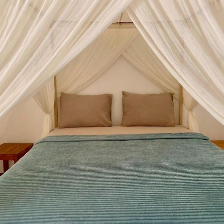 The Village Rua Beach Homestay Buitenkant foto