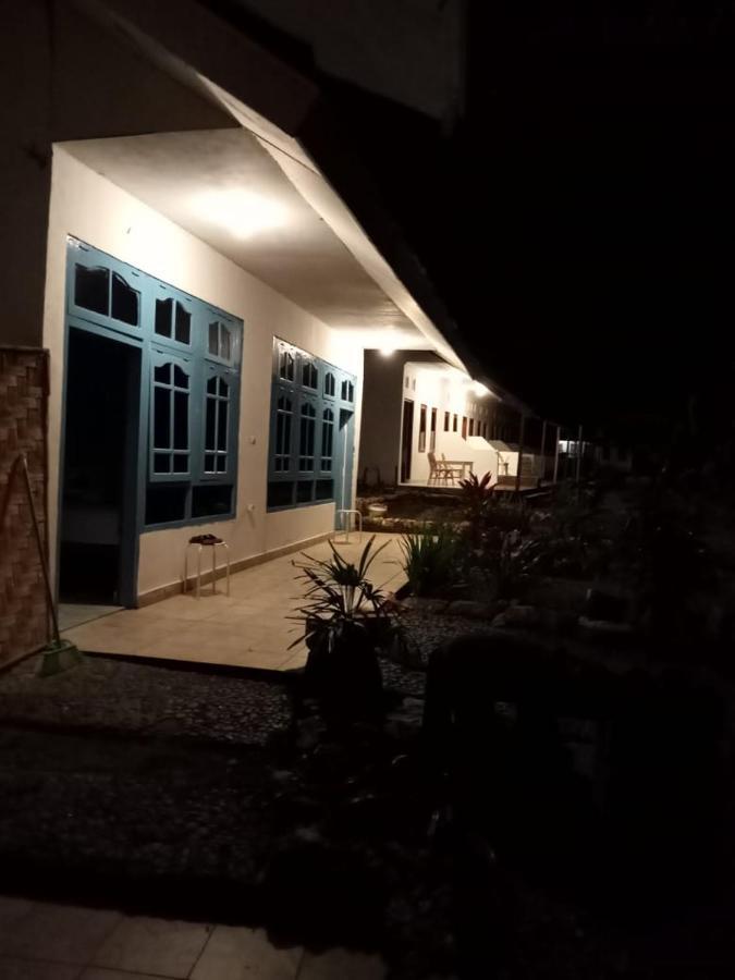 The Village Rua Beach Homestay Buitenkant foto