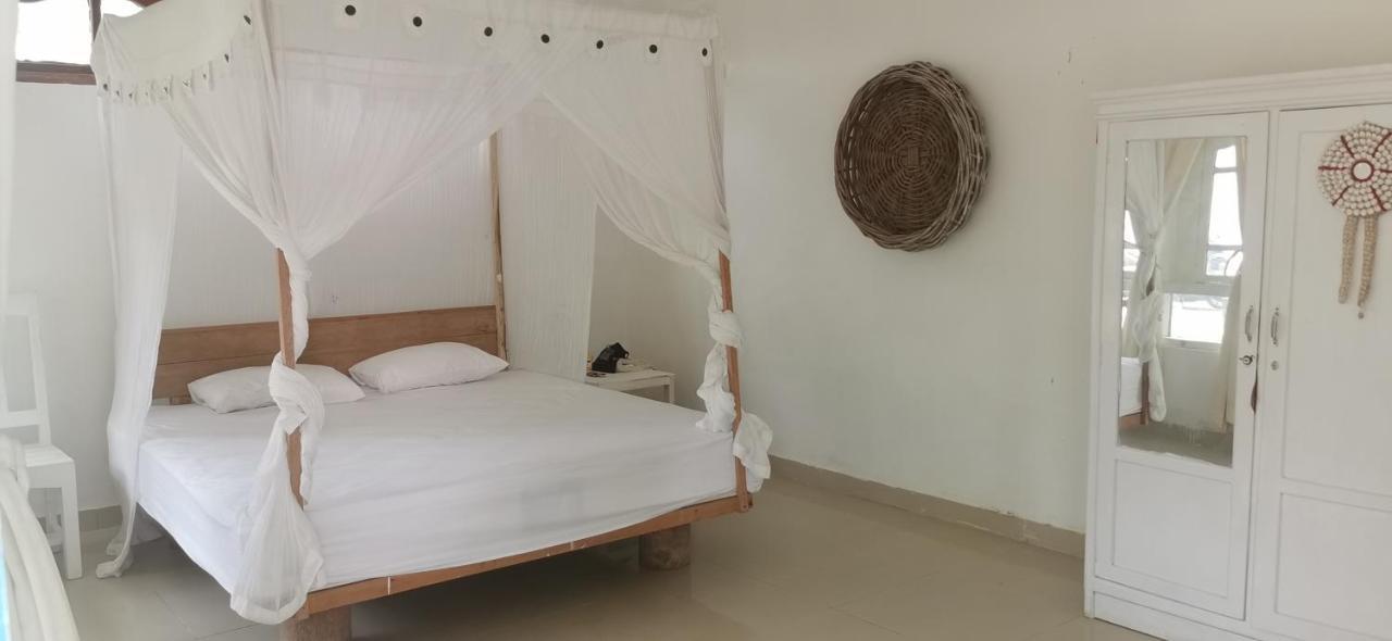 The Village Rua Beach Homestay Buitenkant foto