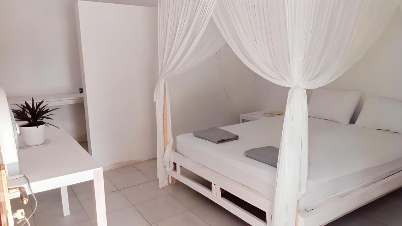 The Village Rua Beach Homestay Buitenkant foto