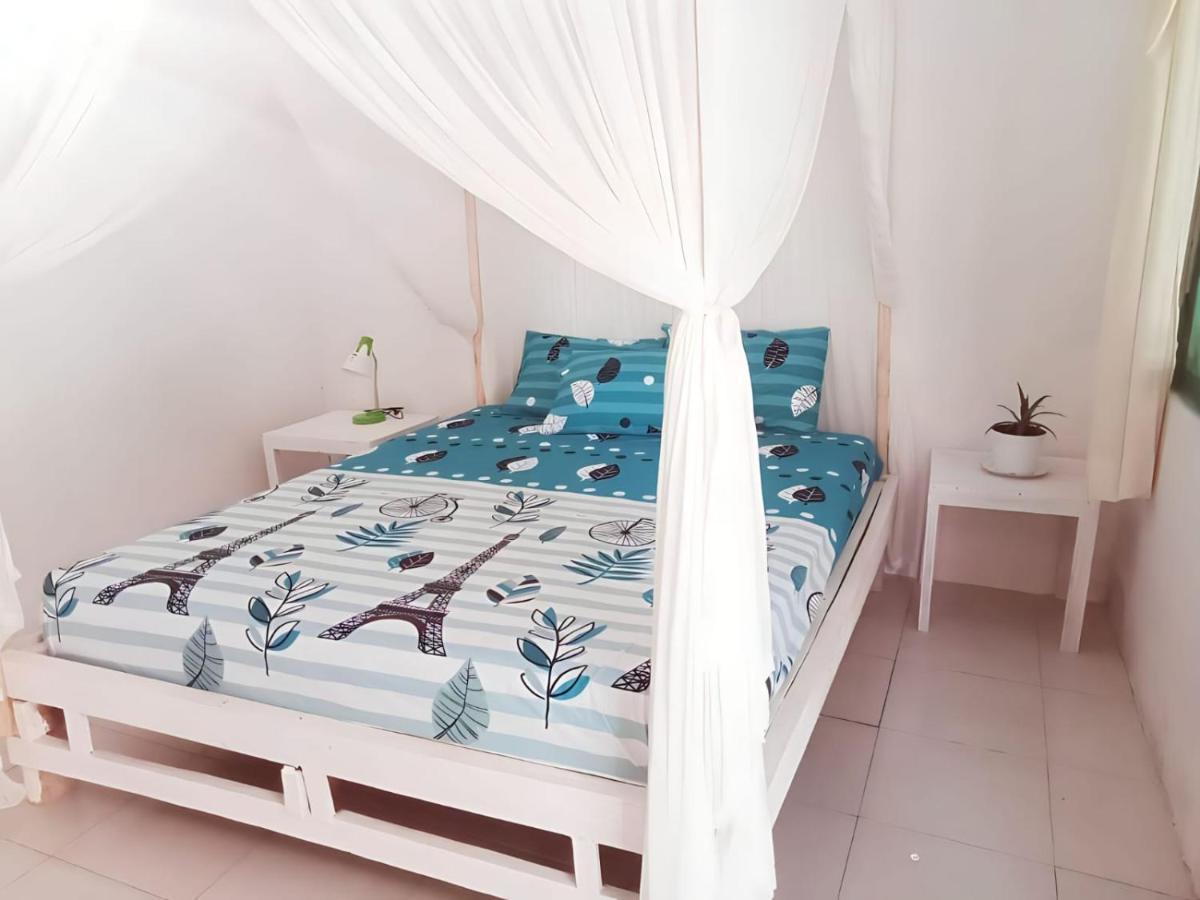 The Village Rua Beach Homestay Buitenkant foto
