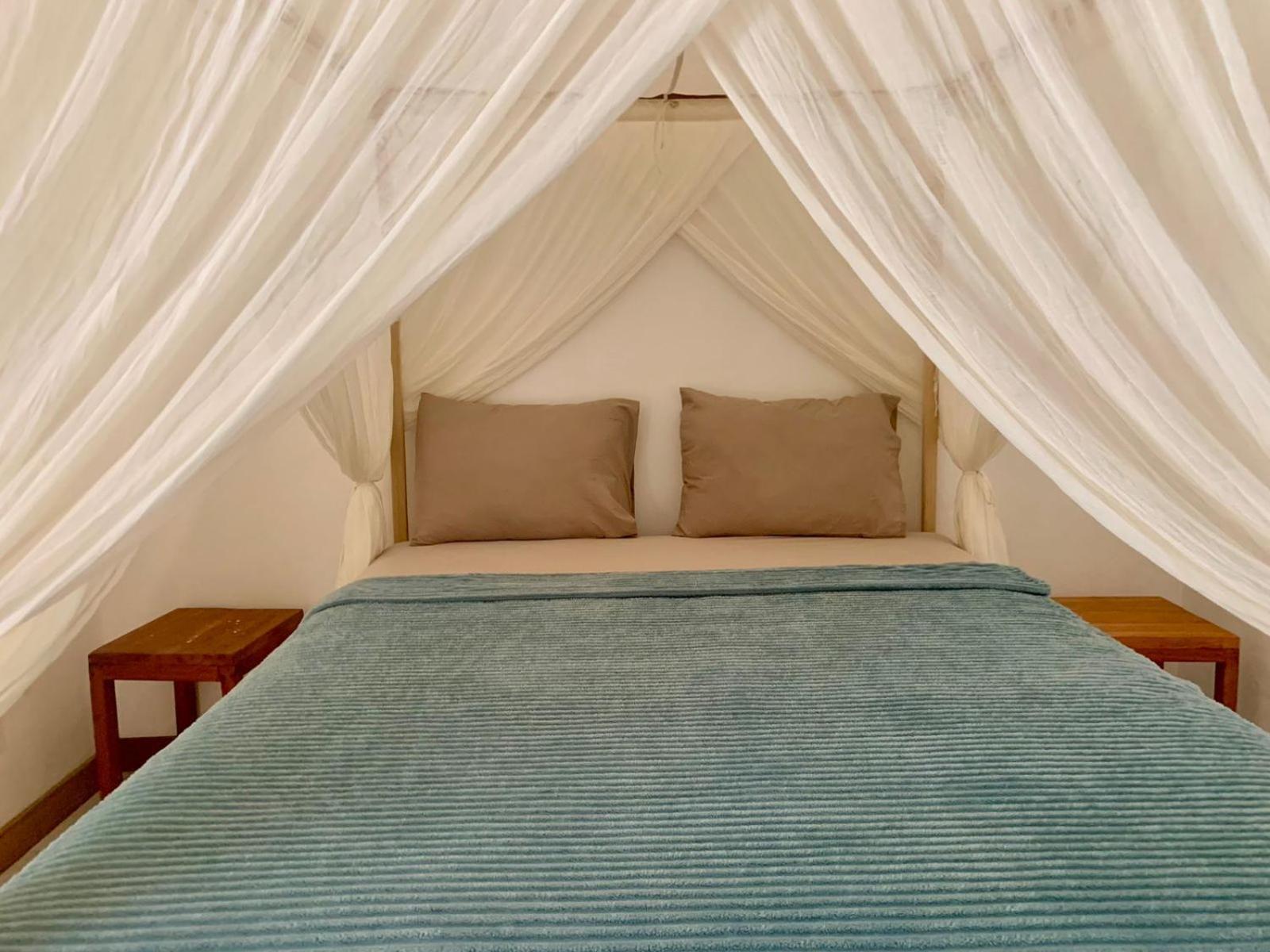 The Village Rua Beach Homestay Buitenkant foto