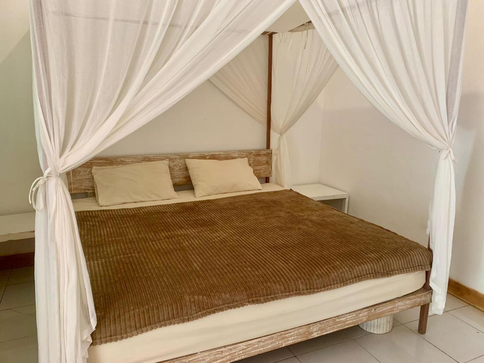 The Village Rua Beach Homestay Buitenkant foto