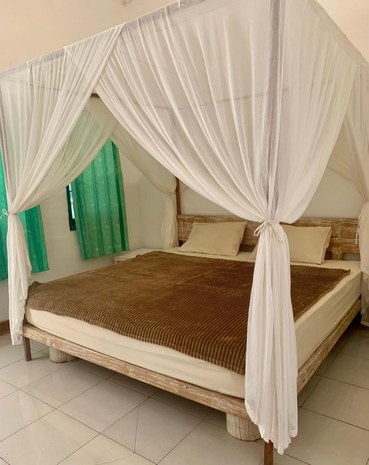 The Village Rua Beach Homestay Buitenkant foto