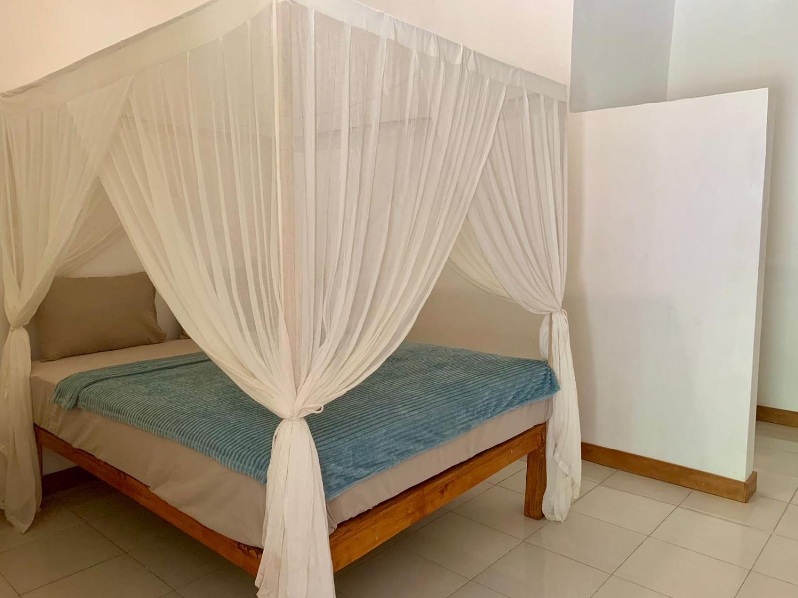 The Village Rua Beach Homestay Buitenkant foto